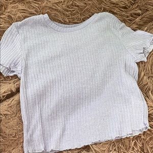 a ruffled purple shirt